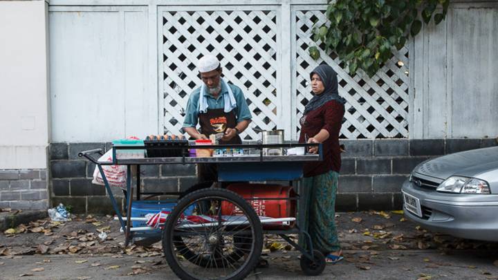 U Kyaw Thien at his stall U Kyaw Thien at his stall