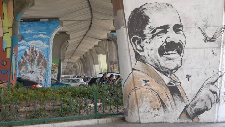 A mural of Chokri Belaid, a politician assassinated in 2013.