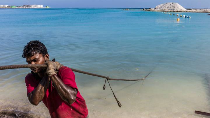 A man working on the coast 