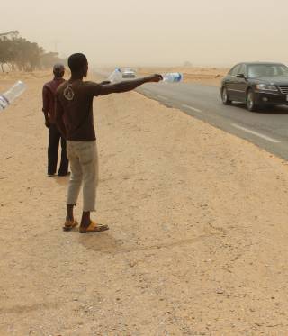 Begging for water on the roadside Begging for water at the Shousha campsite