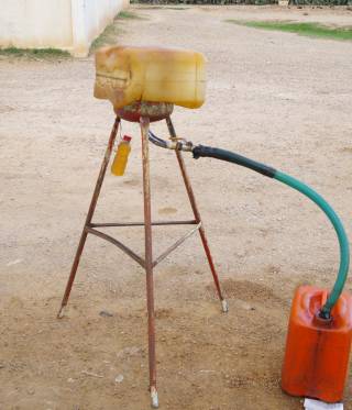 Selling fuel at the road-side Selling fuel at the road-side