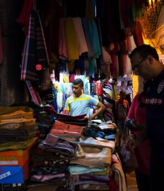In the market A man examines wares in the souk in Tunis' old city.