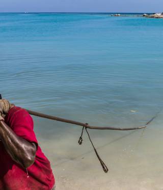 A man working on the coast 