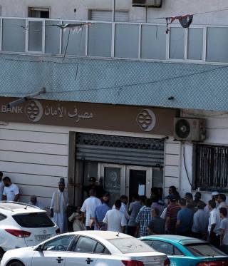 Cashing in on Libya’s division