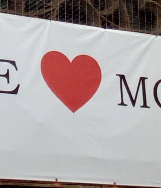 A 'We love Manchester' sign hanging on the Didsbury Mosque, where the Manchester Arena bomber Salman Abedi had worshipped. 