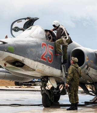 A Russian Su-25 crew at the Hmeymim airbase in the Latakia governorate in western Syria.